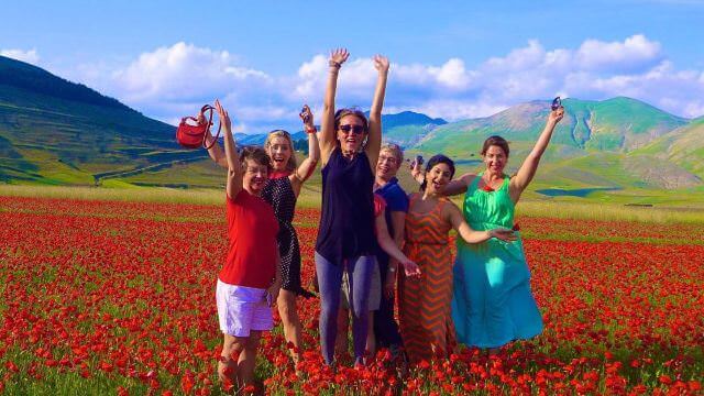 In June, the lentil fields of Castelluccio bloom with beautiful flowers and create amazing photo opportunities